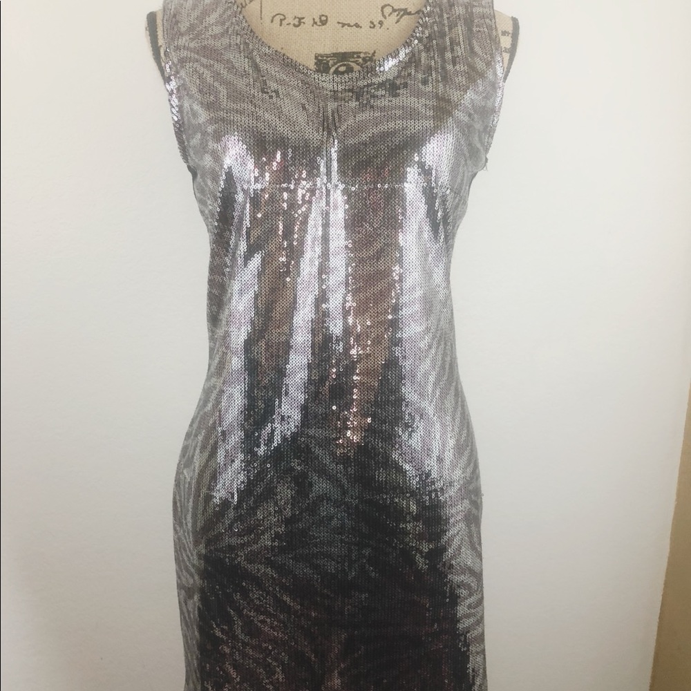 Sequence dress with low cut back
